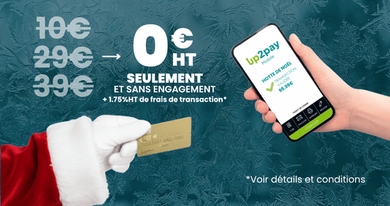 Une main de père noel paie avec sa carte bleue sur une solution de paiement sans fil sur téléphone